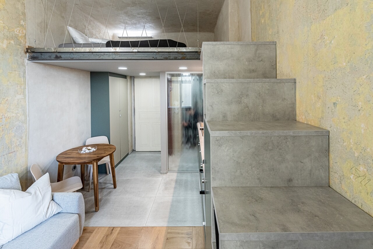 Nietuzinkowy podział mieszkania w Pradze – oryginalny i nieszablonowy styl - projekt Studio Reaktor - foto Michaela Kociánová