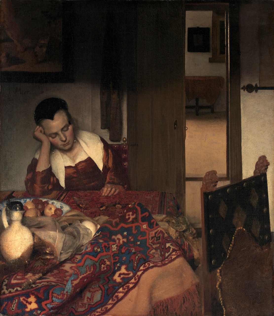 Jan Vermeer - Pijana dziewczyna śpiąca przy stole