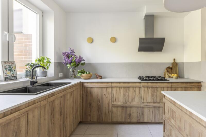 Modern kitchen with wooden fronts and scandi style details.