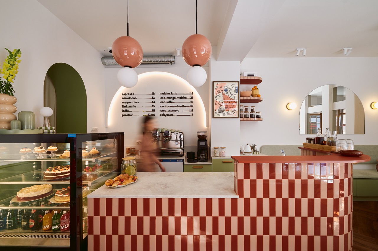 A café with pastel finishes and modern interior design.