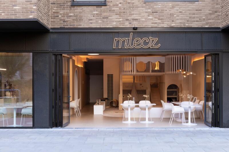 A stylish cafe with a modern interior design.