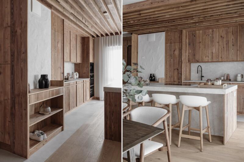 Stylish kitchen with wooden fronts and modern lighting.