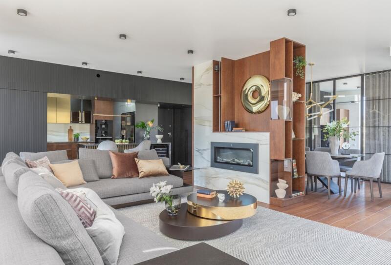 Spacious living room with an elegant fireplace and modern décor.