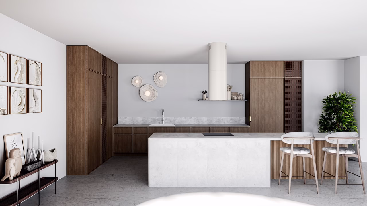 Nowoczesna kuchnia z białą wyspą, drewnianymi szafkami i designerskimi lampami.