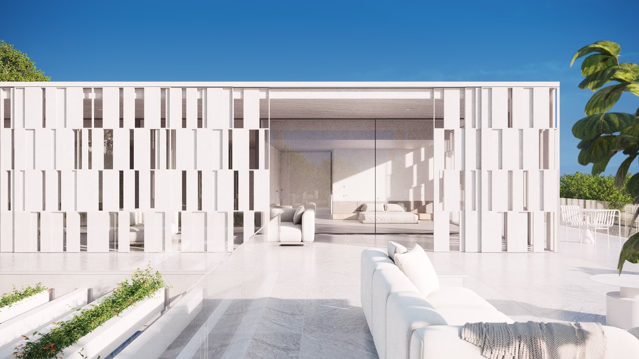Nowoczesna architektura z białymi geometrycznymi panelami i minimalistycznym wnętrzem.