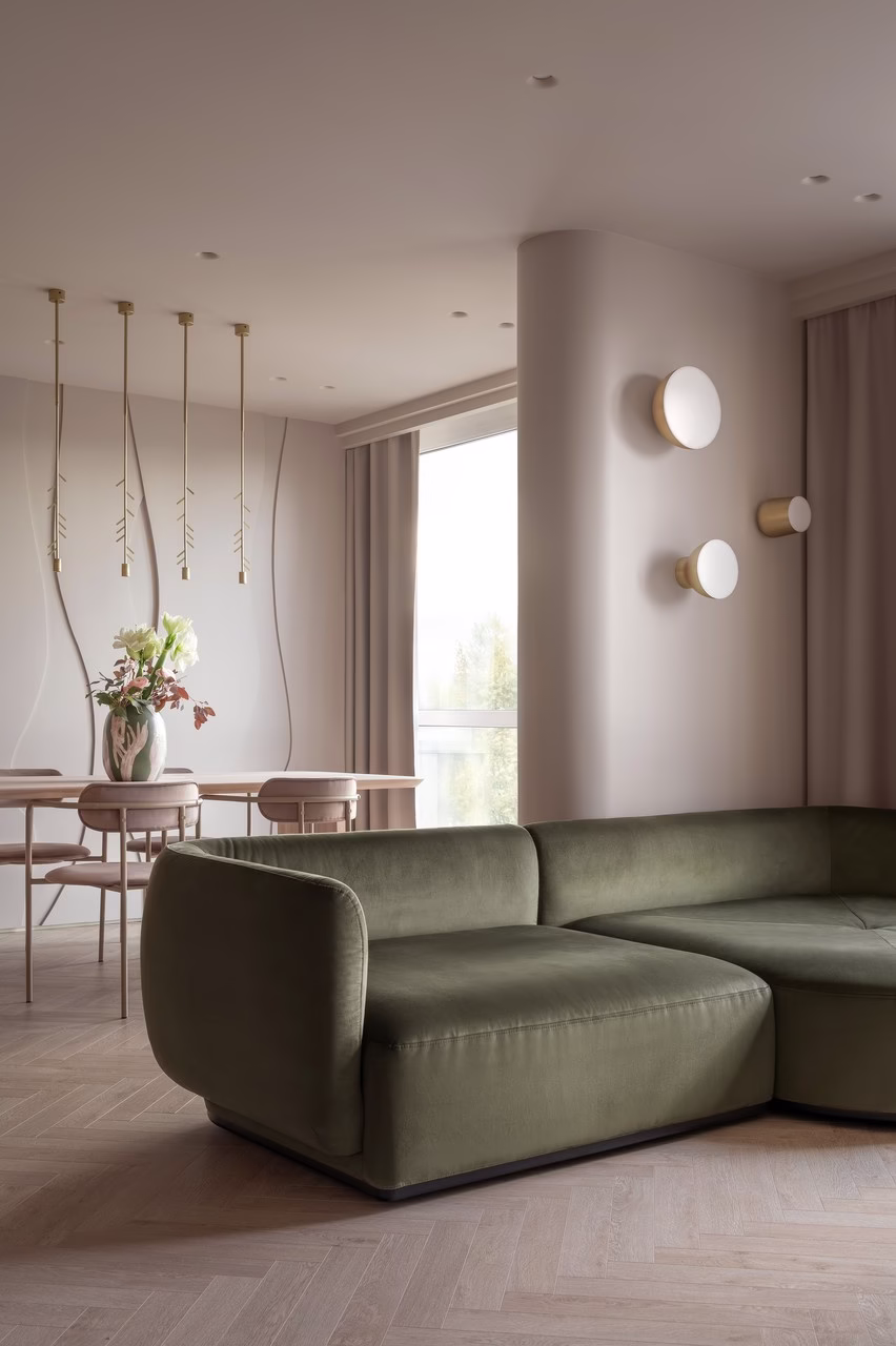 Elegancki salon z zieloną sofą, stylowe oświetlenie, pastelowe zasłony.
